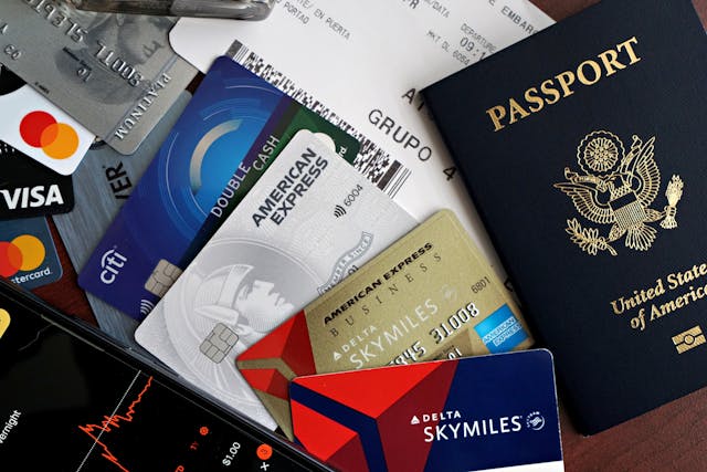 credit cards next to a passport